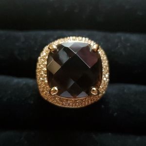 Large goldtone cocktail ring with brown stone